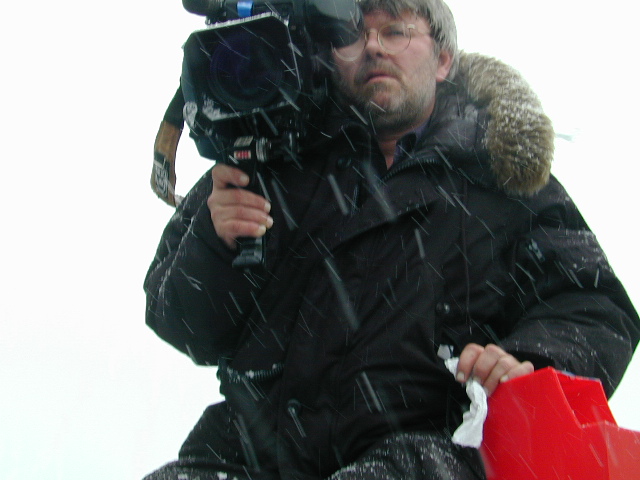 CNN's cameraman got on top of a phone booth: 