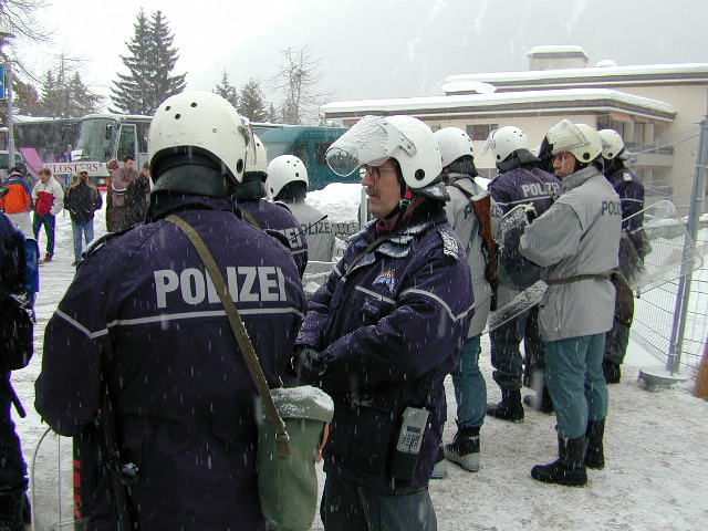 There were many perimeters: This was the last line of defense before the demonstrators could reach the meeting center. There were many perimeter lines between.